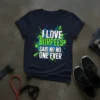 Funny "I Love Burpees Said No One Ever" quote on a navy t-shirt, featuring green and blue abstract graphic elements