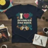 Navy t-shirt with "I Love Divorced Dad Rock" text, heart, guitars, palm trees, and vintage car graphic