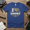 Blue t-shirt with white and gold "I Love Emory" text and heart graphic, surrounded by stars and academic symbols