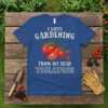 I Love Gardening From My Head Tomatoes quote on a blue t-shirt with a graphic of ripe tomatoes and vines