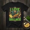 I Love Garlic Bread T-Shirt featuring a demonic figure holding garlic bread and a bowl of sauce. Bold green typography