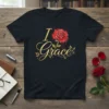 Black t-shirt with "I Love Grace" text and a red watercolor rose graphic, featuring gold script and decorative leaves