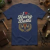 Navy blue t-shirt with "I Love Hairy Balls" text and a graphic of a uterus surrounded by laurel leaves