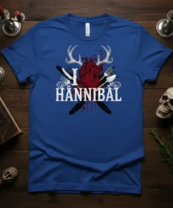 I Love Hannibal t-shirt design with a realistic heart graphic, antlers, crossed cutlery, and feathers