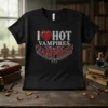 Black t-shirt with "I Love Hot Vampires" text and a red gem heart graphic, featuring a vintage-style vampire design with