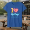 I Love Hubbard text with a red and white striped heart graphic on a blue t-shirt design