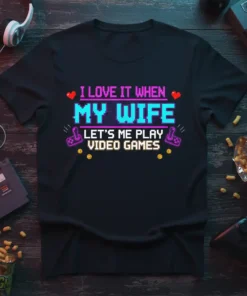 I Love It When My Wife Lets Me Play Video Games text design with pixelated hearts, joysticks, and coins on