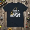 I Love It When She Bends Over fishing quote on a navy t-shirt with fishing rod graphic