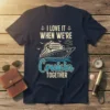 Couple's cruise t-shirt with text "I LOVE IT WHEN WE'RE Cruisin TOGETHER" and a graphic of a cruise ship