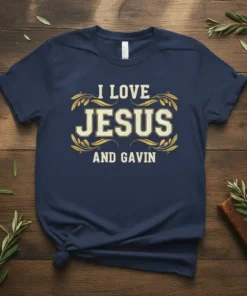 I Love Jesus And Gavin text design with ornate gold leaf accents on a navy t-shirt