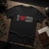 Black t-shirt with distressed "I Love KC" graphic, featuring a red heart and textured "KC" letters