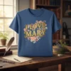 Blue t-shirt with "I Love Mary" text in glittery gold font surrounded by floral and swirl designs