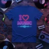 I Love Music neon sign graphic with a heart and waveform on a blue t-shirt