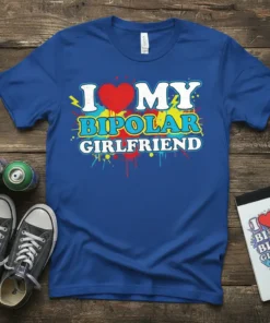 I Love My Bipolar Girlfriend text design with a red heart and colorful paint splatters on a blue t-shirt