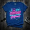 I Love My Cougar Girlfriend text with neon heart and retro geometric graphics on a blue t-shirt