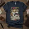 T-shirt design with text "I Love My Cougar Girlfriend" featuring a fierce cougar head and roses