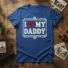 Blue t-shirt with "I Love My Daddy" text and a red heart graphic inside a decorative frame