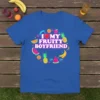 Blue t-shirt with "I Love My Fruity Boyfriend" text surrounded by colorful fruit graphics like watermelon, pineapple, and banana