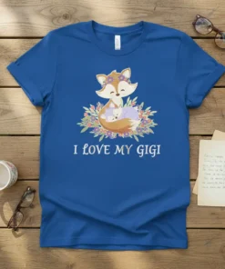 Blue t-shirt with "I LOVE MY Gigi" text and a graphic of a mother fox hugging her baby fox, surrounded