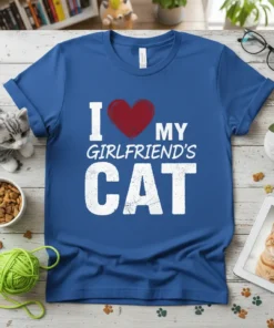 I Love My Girlfriend's Cat text with a red heart graphic on a blue t-shirt, featuring distressed white lettering