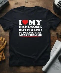 I Love My Handsome Boyfriend So Please Stay Away From Me quote on a black t-shirt, white and red text