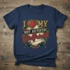 I LOVE MY HOT AUTISTIC Girlfriend text design with a heart and floral accents, on a navy blue t-shirt