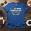 I Love My Hot Boyfriend T-Shirt with red heart graphic and gold laurel wreath design on blue tee