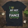 I Love My Hot Irish Fiancé text with heart and shamrocks design on a black t-shirt