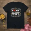 I Love My Hot Italian Wife text with a heart graphic on a black t-shirt, designed for husbands
