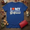 I Love My Hot Latina Girlfriend text with a red heart graphic on a blue t-shirt