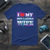 I Love My Hot Latina Wife text graphic with heart and neon outline on a blue t-shirt
