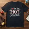 I Love My Hot Teacher t-shirt with heart graphic, books, and science flask design