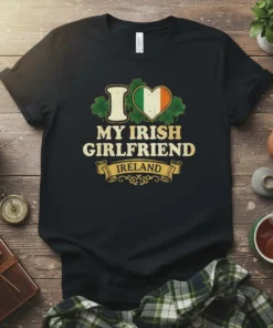 Black t-shirt with "I Love My Irish Girlfriend Ireland" text and an Irish flag heart graphic, surrounded by shamrocks