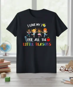 T-shirt with "I Love My Job For All The Little Reasons" text and cartoon children, pencil, and apple graphics