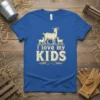 I love my KIDS t-shirt design with a mother goat and two baby goats, set against a rural background