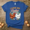 I LOVE MY Ladies T-Shirt featuring two chickens, a barn, and floral accents