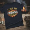I Love My Smokin Hot Husband t-shirt with flames graphic, bold distressed typography, and gold and red accents