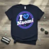 I Love Naomi text with geometric heart graphic on navy t-shirt, neon border, retro style