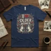 Navy blue t-shirt with "I Love Older Women" text, a red heart, and vintage illustrations of women and swallows