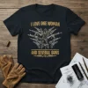 T-shirt design with text "I Love One Woman and Several Guns" surrounding a woman holding firearms