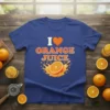 I Love Orange Juice t-shirt design with a heart icon and a splashing orange graphic