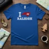 Blue t-shirt with "I Love Raleigh NC" text and North Carolina map graphic, representing the I Love Raleigh NC T-Shirt