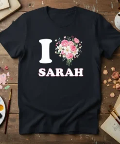 I Love Sarah t-shirt with a white 'I', a floral heart graphic, and 'Sarah' in pink lettering