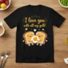 I love you with all my yolk text above cute toast and fried egg illustration on black t-shirt