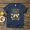 I LOVE YOU A BRUNCH text with champagne glasses and breakfast food graphics on a navy t-shirt