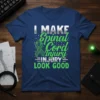 I Make Spinal Cord Injury Look Good text with green awareness ribbon and typography on a navy t-shirt