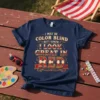T-shirt with text "I May Be Color Blind But I Know I Look Great In Red" in vintage style font