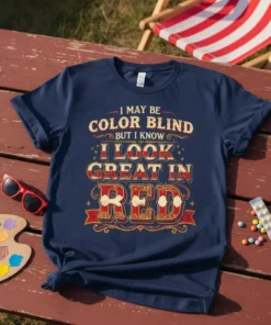 T-shirt with text "I May Be Color Blind But I Know I Look Great In Red" in vintage style font