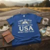 Blue t-shirt with white text "I May Be Old But The USA Before It Went To Shit" and graphic of