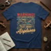 Navy t-shirt with "Warning! I May Spontaneously Talk About Airplanes" text and vintage airplane graphic